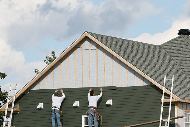 Professional Siding Installation technician working in Four Oaks, NC